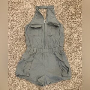 No Vacancy cargo jumpsuit olive/army green breast pockets, mock neck, zip front